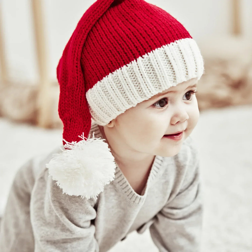 Le Pompon de Noël — Bonnet de Noël en tricot pour petits et grands.